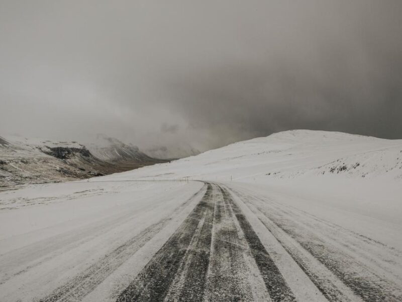 Empty winter road symbolizing a career turning point and journey forward